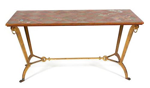 A Painted and Gilt Iron Center Table in the Style of Rene Rouet Height 30 x width 60 x depth 22 inches.