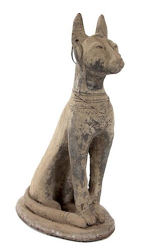 A Terracotta Statue of a Seated Egyptian Cat Height 31 x width 11 1/2 x depth 17 1/2 inches.