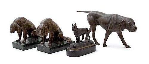 A Group of Bronze Models of Dogs Length of largest 15 1/2 inches.