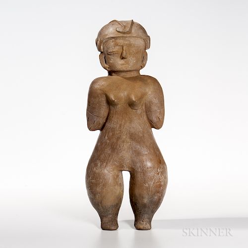 Chorrera Female Figure, c. 1000-500 BC, tall figure standing on rounded legs and slim torso tapering into short robust arms held close