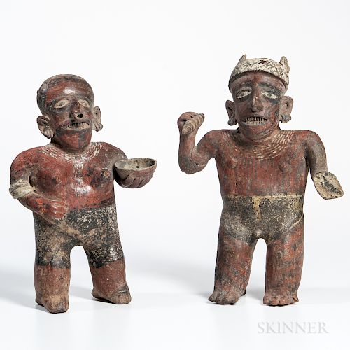 Pair of Nayarit Male and Female Figures, western coast of Mexico, c. 100 BC-250 AD, polychrome decorated hollow pottery figures, the fe