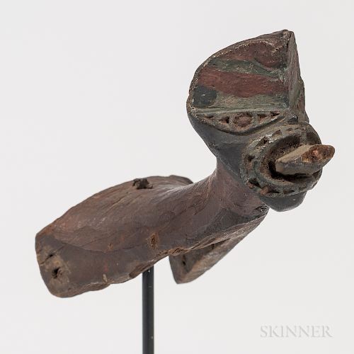Model Canoe Prow Ornament, Maori, early 19th century, wood with traces of pigments, carved prow tiki figure, for a model canoe, pierced
