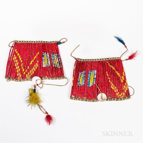 Pair of Plains Quillwork Leg Cuffs, fourth quarter 19th century, backed by red trade cloth, with leather strips top and bottom, decorat