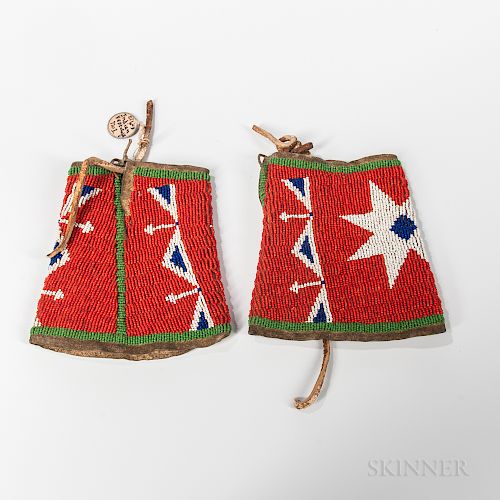 Pair of Plains Beaded Hide Cuffs, Lakota, last quarter 19th century, hide-backed beaded cuffs with star motifs, old tag reads "Sioux In