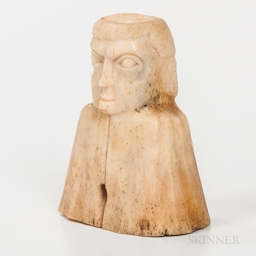 Northwest Coast Carved Whalebone Bust, Haida, c. 1840-50s, with old inventory painted in black on the back "22-1 1876," ht. 2 7/8 in. P
