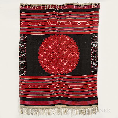 Mexican Serape, c. 1900, made from two sections stitched together, with a central medallion device and long fringes, 75 1/2 x 57 1/2 in