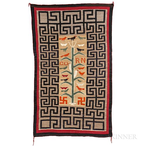 Navajo Corn Rug, c. 1920-1925, woven with natural and synthetic dyed homespun wool, with central white corn motif with birds, surrounde