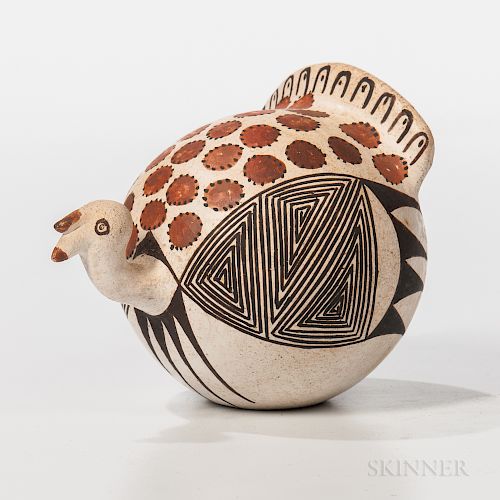 Acoma Polychrome Pottery Turkey, signed "Lucy M. Lewis," decorated with abstract feather designs in browns, ht. 3 1/4 in.