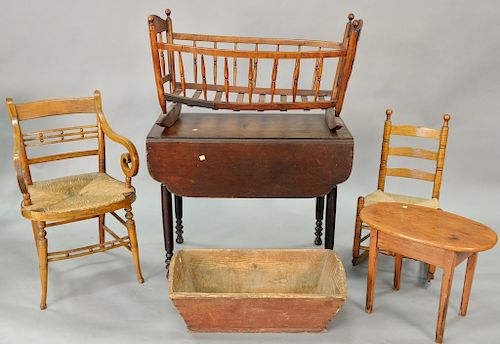 Nine piece lot to include a tiger maple chair, Sheraton armchair and table, cradle, child's rocker, marble top stand, one door cabin...