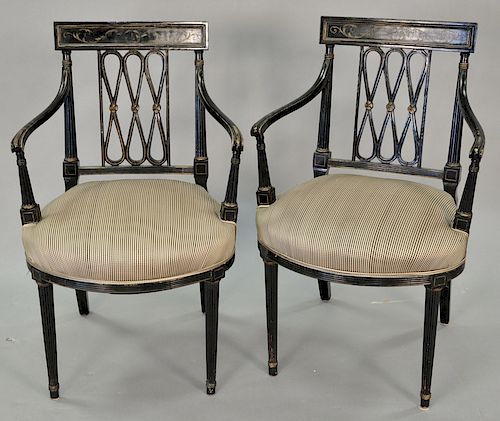 Pair of Sheraton style black armchairs.