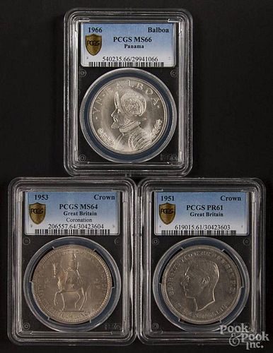 One Panamanian silver Balboa, 1966, PCGS MS-66, together with two British Crowns, 1951, PCGS PR-61,