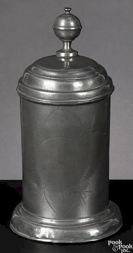 German pewter tankard, early 19th c., the body decorated with a large sunflower flanked by tulips