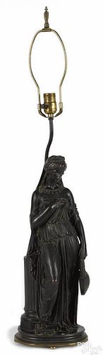 French patinated bronze figural lamp, late 19th c., of a classical woman holding a tortoise shell