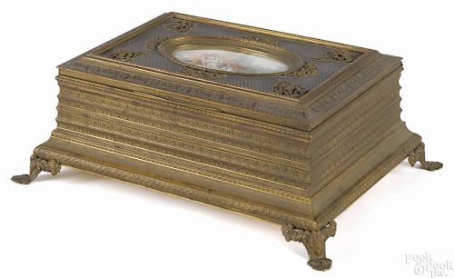 Austrian bronze dresser box, early 20th c., the lid with an inset watercolor courting scene