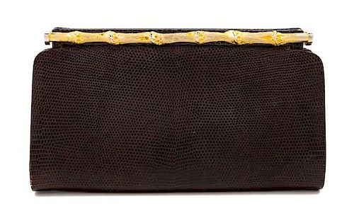 A Gucci Brown Snakeskin Clutch, 4.75" H x 8.25" W x 1.25" D.