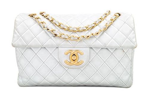 A Chanel Silver Leather Jumbo Flap Bag, 8" H x 13" W x 4" D; Strap drop: 11.5" - 20".