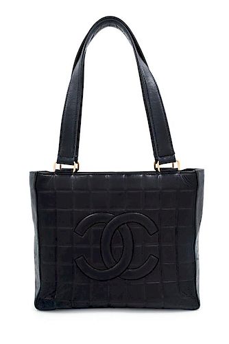A Chanel Black Lambskin "Chocolate Bar" Tote, 8" H x 10" W x 3.25" D; Strap drop: 9".