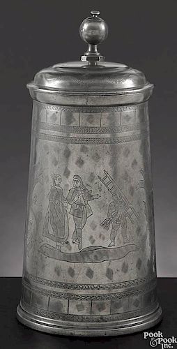 German pewter stein or Bierkrug, early 18th c., the body with profuse wrigglework decoration