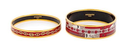 A Set of Hermès Red 65mm Enamel Bangles, 6.5" diameter, .4" W; 6.5" diameter, .75" W.