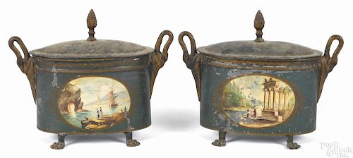 Pair of French tôle peinte tin tea caddies, ca. 1830, each with double-sided landscape decoration