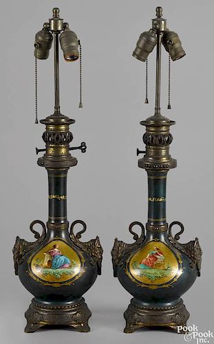 Pair of Continental ormolu and painted metal table lamps, 19th c., each with an oval reserve