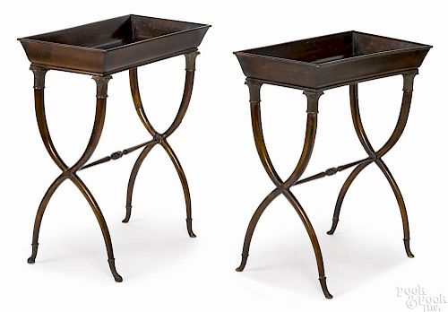 Pair of Continental mahogany ferniers, late 19th c., the legs with bronze capitals and feet