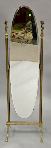 Oval brass cheval mirror with beveled glass attributed to Peerage England. ht. 54 in.