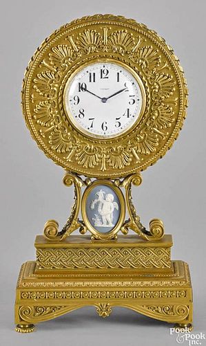French gilt bronze mantel clock, late 19th c., with a Swiss movement, signed on face
