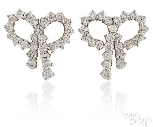 Pair of platinum diamond bow earrings