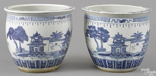 Pair of Chinese blue and white porcelain jardinières, 13 3/4'' h., 15 3/4'' w.