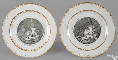 Pair of Chinese export porcelain European subject plates, 18th c., decorated in grisaille