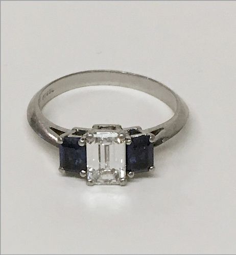 TIFFANY EMERALD CUT DIAMOND SOLITAIRE FLANKED BY