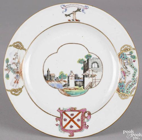 Chinese export porcelain armorial plate, 18th c., with a central vignette with European buildings