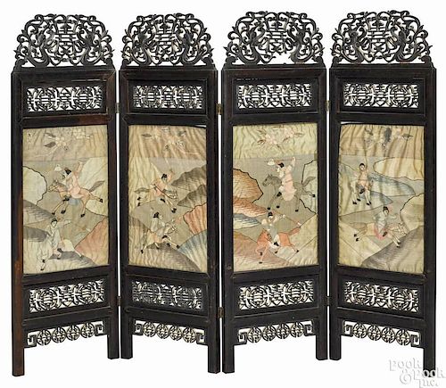 Chinese carved rosewood table screen, ca. 1900, with embroidered panels, 31 3/4'' h., 41'' w.