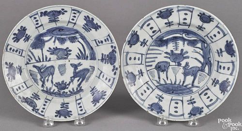 Two Chinese Kangxi blue and white shallow bowls depicting deer in a landscape, 8 1/4'' dia.
