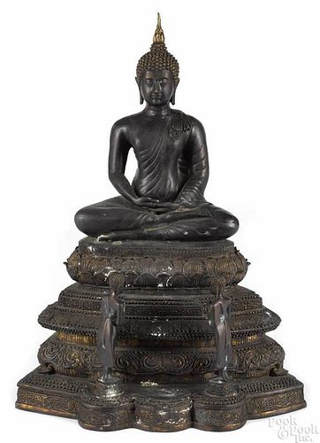 Southeastern Asian bronze figure of a seated Buddha, 21 1/2'' h.