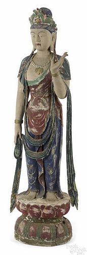 Large Cambodian carved and painted figure of a deity, 63'' h.