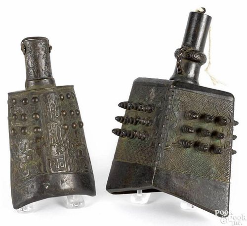 Two Chinese bronze bells, 8 1/2'' h. and 7'' h.