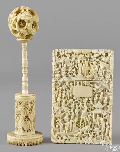Chinese carved ivory card case, late 19th c., 4 1/2'' x 3'', together with a puzzle ball, 6 1/2'' h.