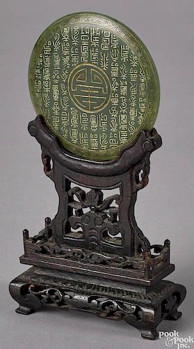 Chinese spinach jade bi-disc with archaic characters, 2 7/8'' dia.