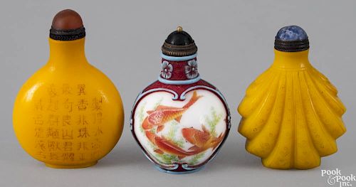 Three Chinese glass and porcelain snuff bottles, 2 3/4'' h., 2 3/4'' h., and 2 1/2'' h.