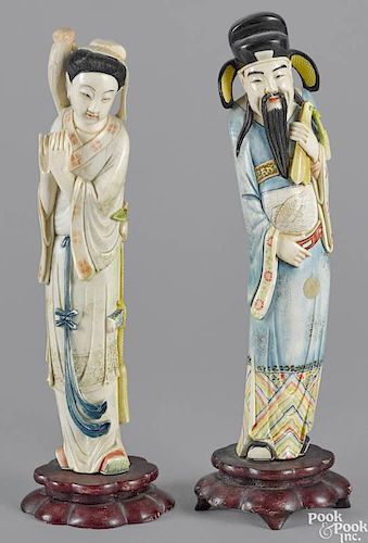 Pair of Chinese carved and polychrome decorated ivory figures of a man and woman, late 19th c.