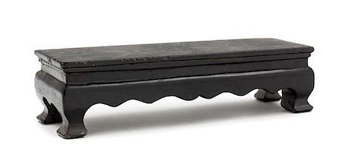 * A Chinese Black Hardstone Stand Length 8 1/4 inches.