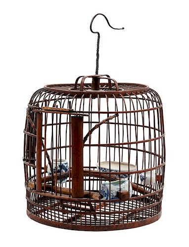 * A Chinese Bamboo Birdcage Height 18 inches.