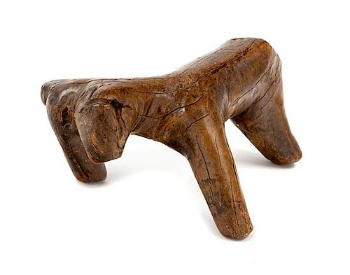 * A Chinese Wood Figure of an Ox Length 9 1/2 inches.