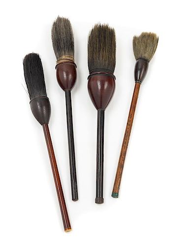 * Four Chinese Hardwood Calligraphy Brushes Length of largest 7 inches.