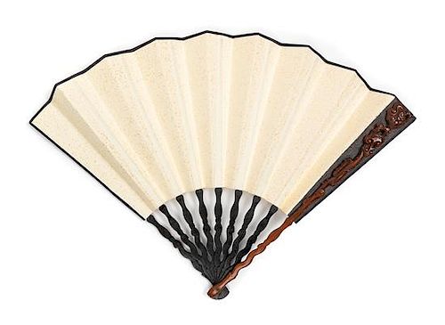 * A Chinese Hardwood Mounted Paper Fan Length 12 inches.