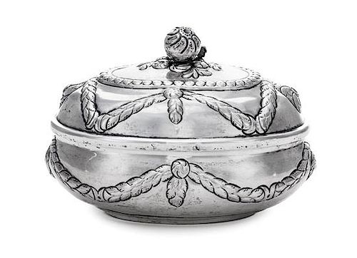 * A German Silver Oval Sugar Box, Maker's marks obscured, Hanau, 19th Century, the hinged oval box worked with repousse husk gar
