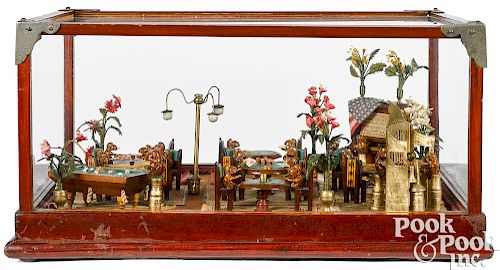 Gambling parlor game room in glass display case
