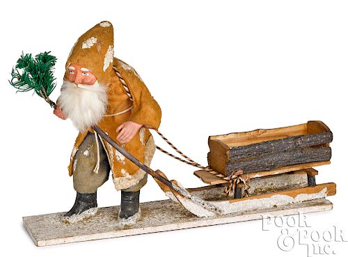 German Santa Claus pulling a sleigh